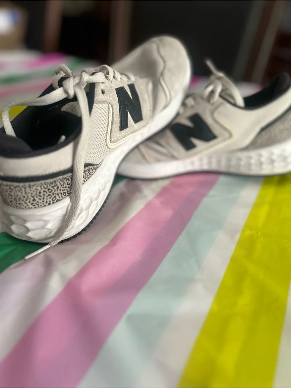 New Balance women’s Beige and Black Athletic Sneakers size 7.5.